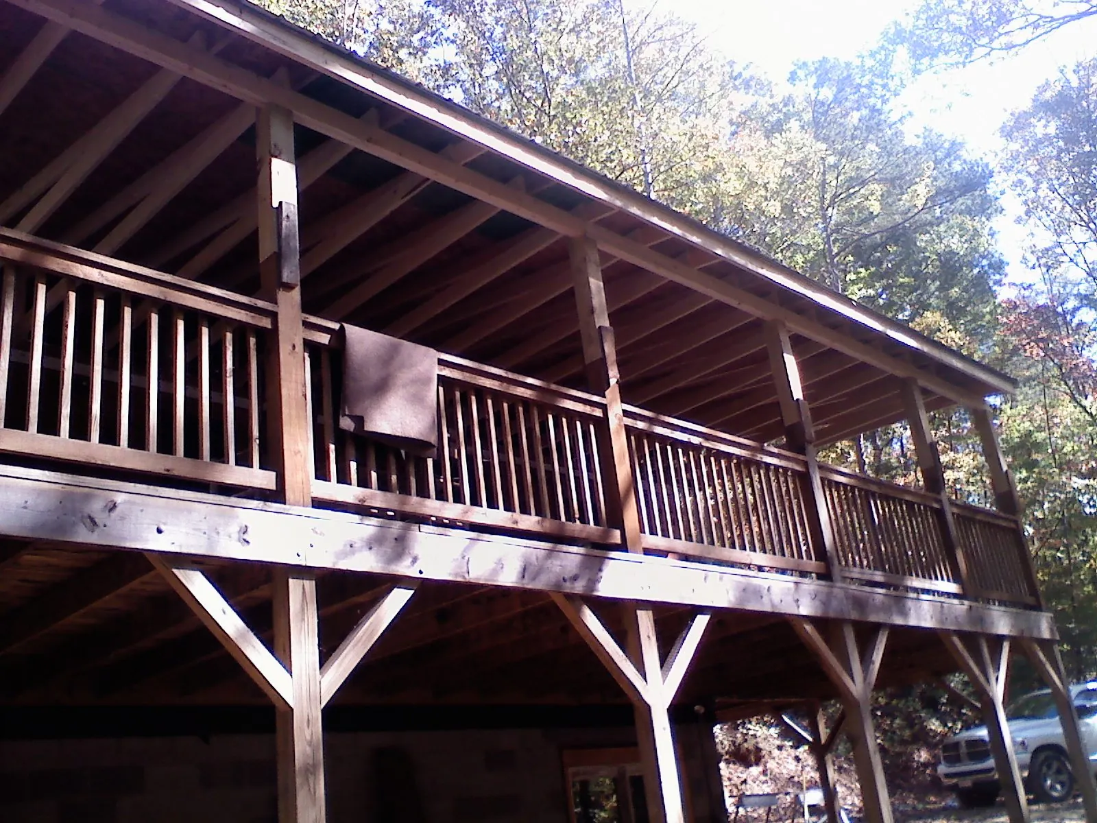 Timber framing under a new elevated porch and deck — Roof Leak Repair in North Hollywood by Roofing Brothers